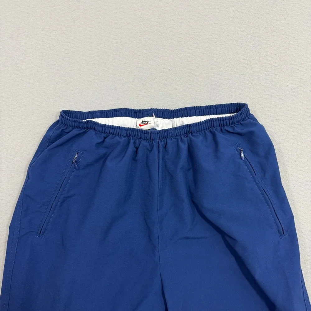 Vintage Nike Pants Womens Large Blue Track Pants Windbreaker Ankle Zip Pockets